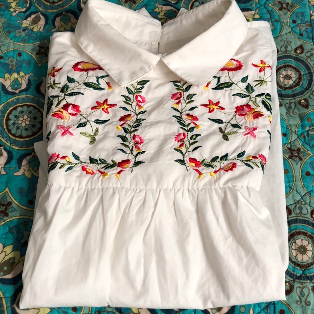 Embroidered baby doll style top